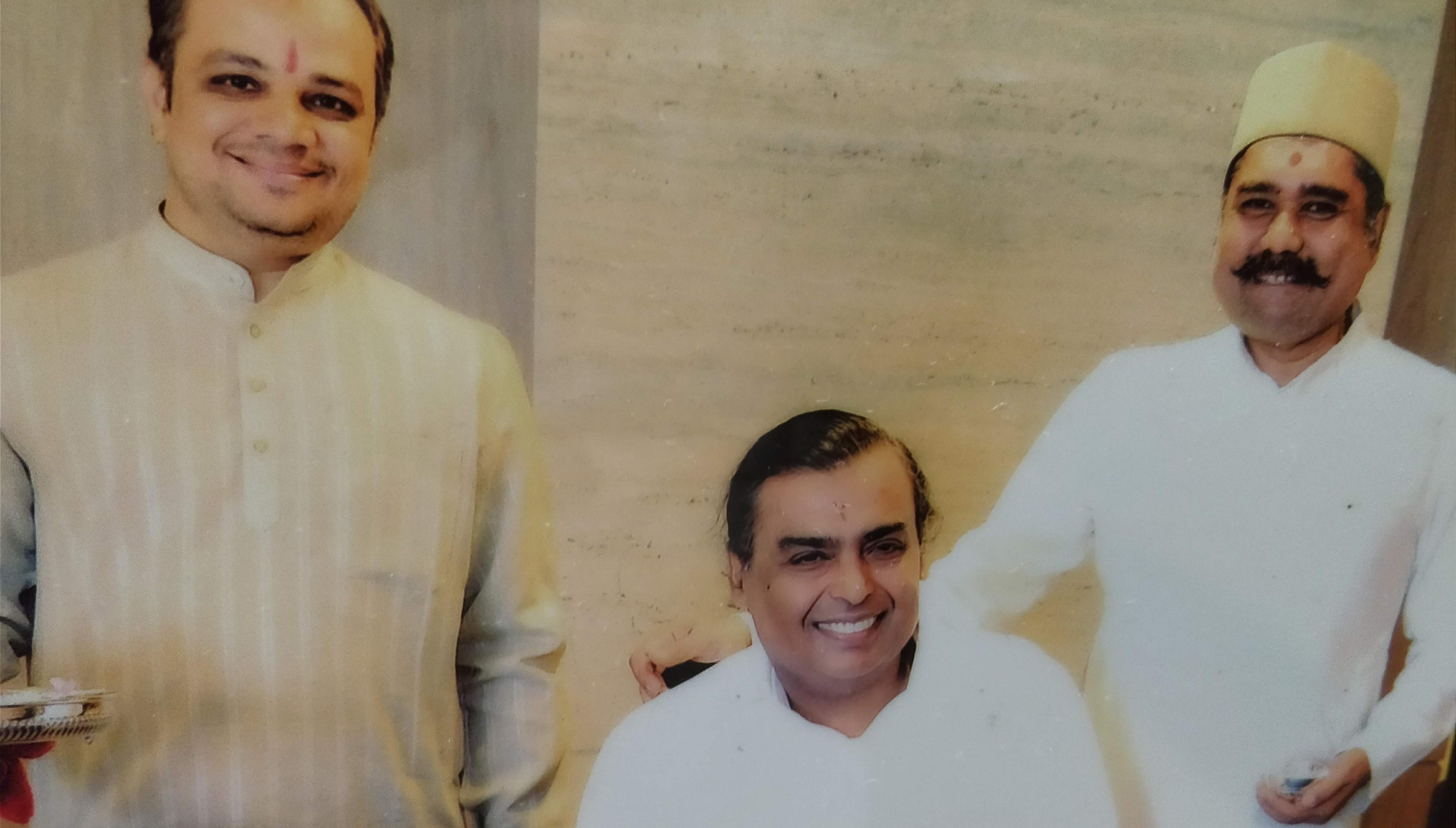 Pandit Chandrashekhar Sharma with the Ambani Family