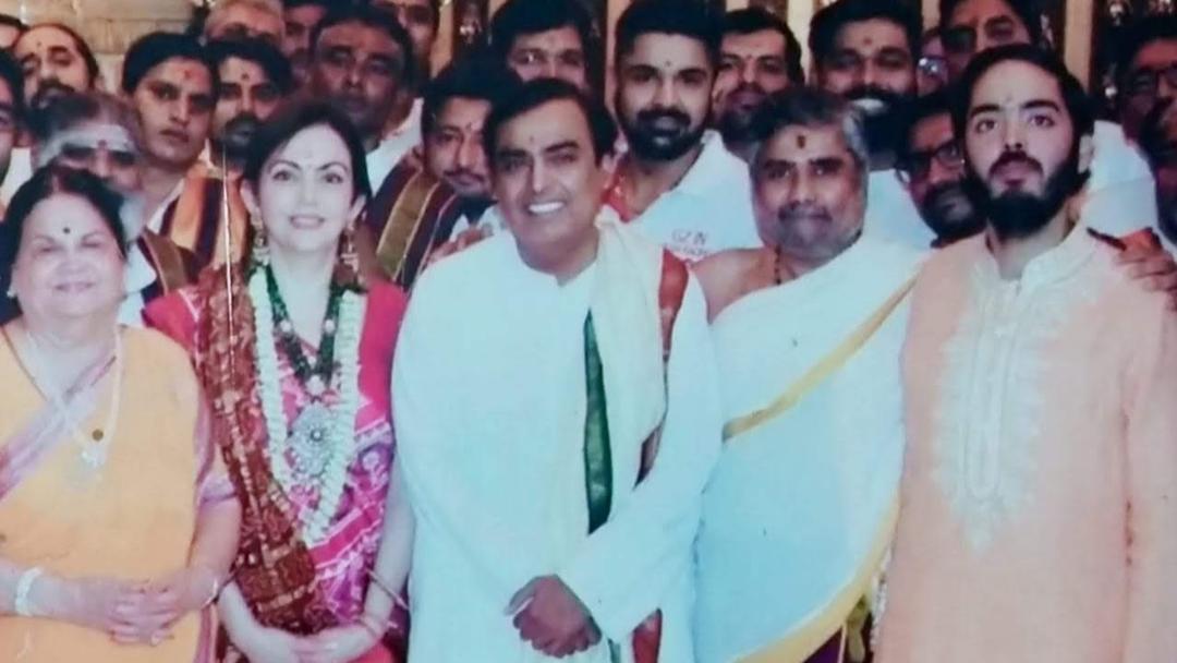 Pandit Chandrashekhar Sharma with the Ambani Family